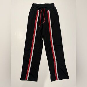 Perfect Moment Black Pants with Red and White Accents